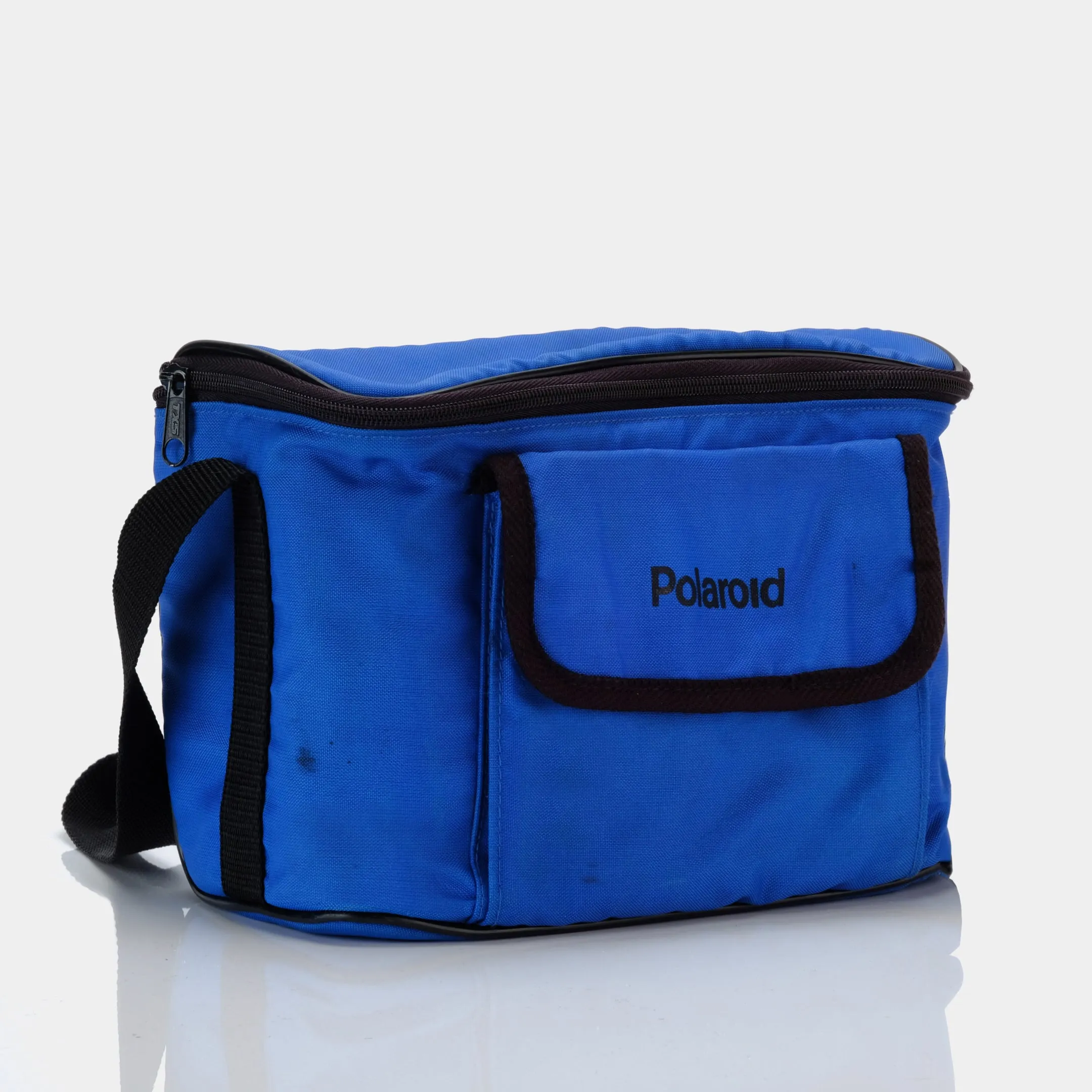 Blue Polaroid Camera and Film Bag