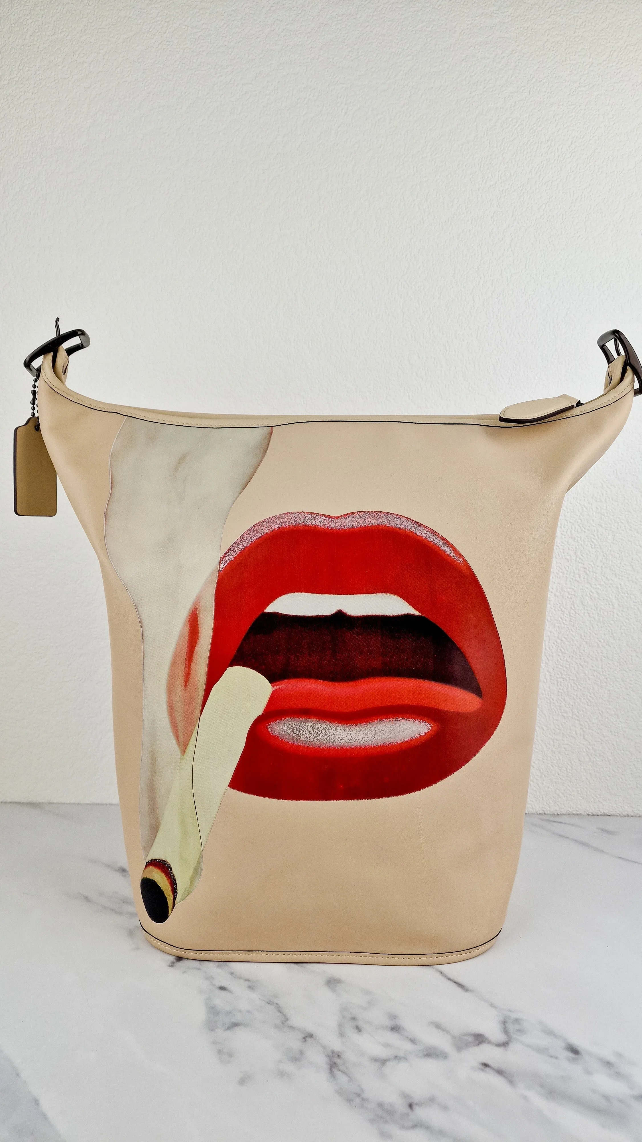 Coach x Tom Wesselmann Duffle 27 Bucket Bag in Ivory With Cigarette Lips - Coach CA306