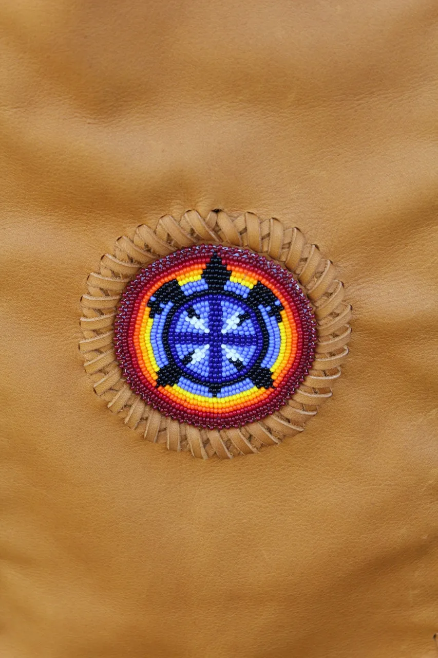 Leather pipe bag with beaded turtle , fringed chanupa bag