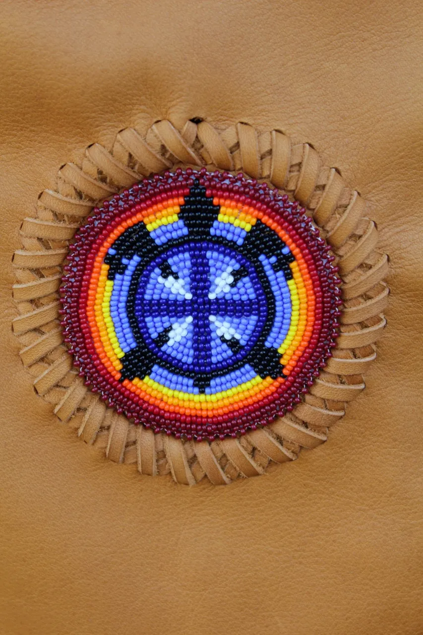 Leather pipe bag with beaded turtle , fringed chanupa bag